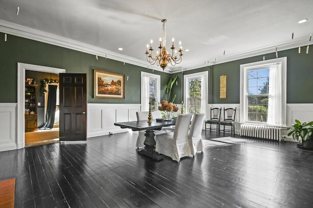 824 Tucker Rd, Dartmouth, MA 02747 - dining area with radiator heating unit, a wainscoted wall, a chandelier, a decorative wall, and ornamental molding