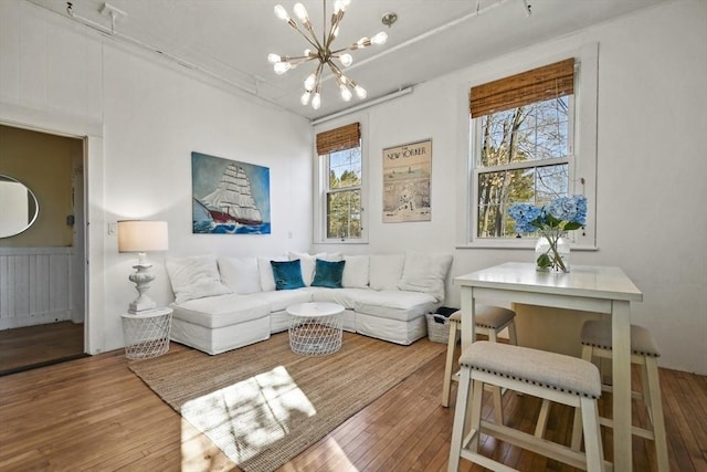 824 Tucker Rd, Dartmouth, MA 02747 - living area with a chandelier and wood-type flooring