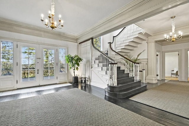 824 Tucker Rd, Dartmouth, MA 02747 - foyer featuring a chandelier, a decorative wall, crown molding, stairs, and french doors