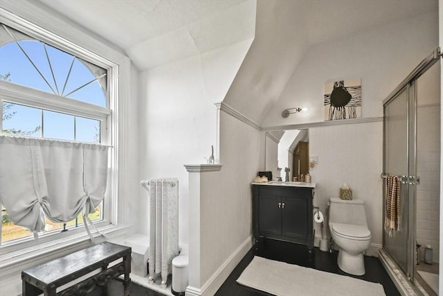824 Tucker Rd, Dartmouth, MA 02747 - full bath with toilet, lofted ceiling, radiator heating unit, a shower stall, and vanity