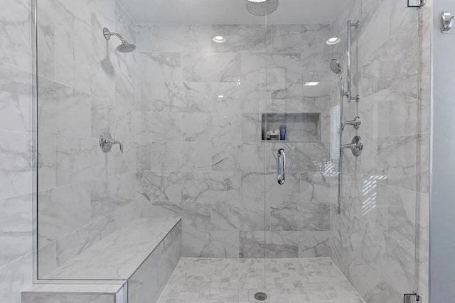 bathroom with a stall shower