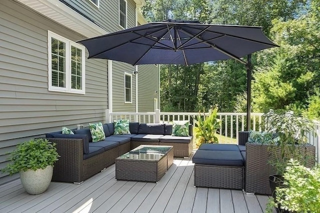 wooden terrace with an outdoor hangout area