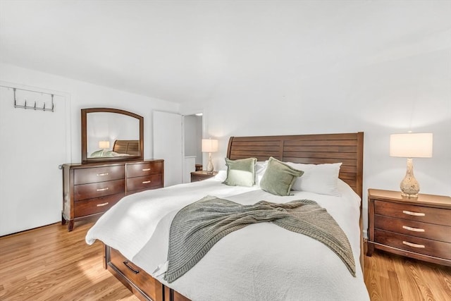 bedroom featuring light wood finished floors