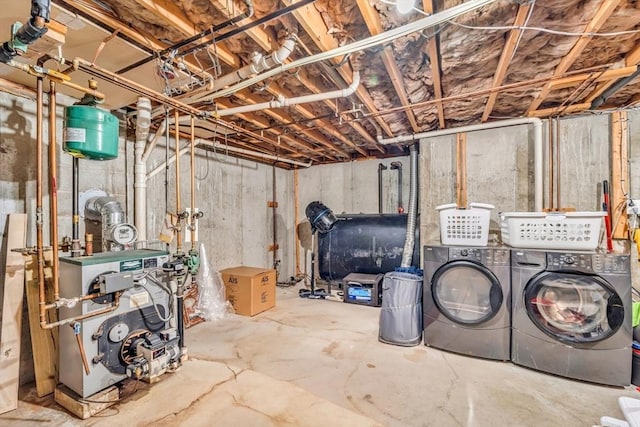 unfinished below grade area with heating fuel, washing machine and dryer, and a heating unit