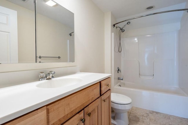 full bathroom featuring tile patterned flooring, shower / bath combination, vanity, and toilet