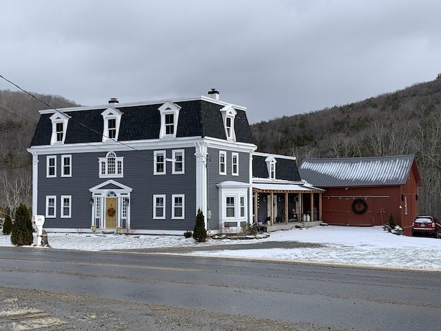 295 Jacksonville Rd, Colrain, MA 01340 - second empire-style home with mansard roof and a chimney