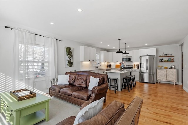 living room featuring light wood-type flooring