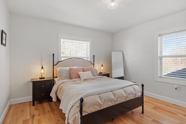 bedroom with light wood-type flooring