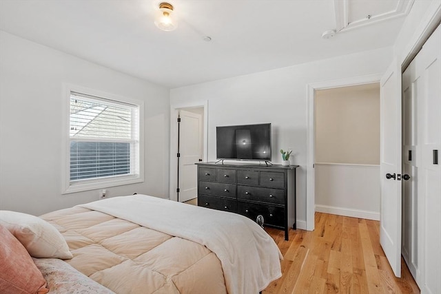 bedroom with light hardwood / wood-style flooring