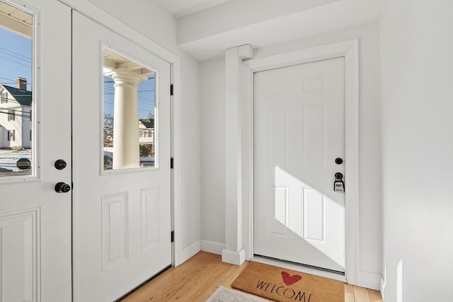 doorway with light hardwood / wood-style floors