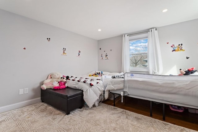 bedroom with light wood-type flooring