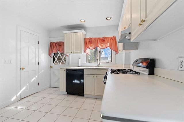 kitchen featuring light tile patterned floors, sink, black dishwasher, and range