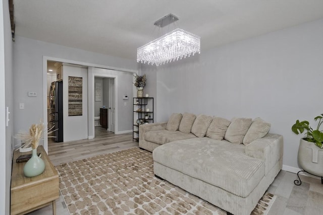 210 Naismith, Springfield, MA 01104 - living room featuring a chandelier and wood finished floors