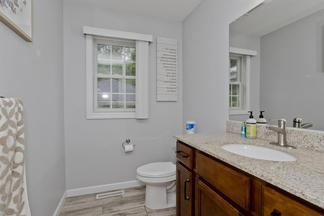 210 Naismith, Springfield, MA 01104 - bathroom featuring vanity and wood finished floors