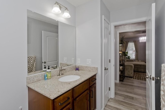210 Naismith, Springfield, MA 01104 - bathroom featuring vanity and wood finished floors