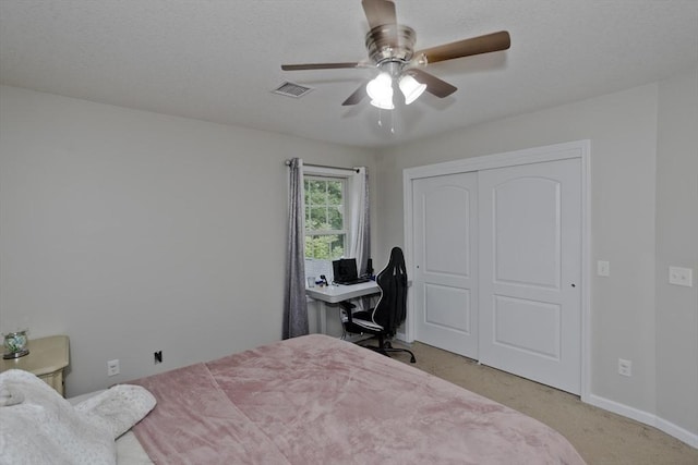 210 Naismith, Springfield, MA 01104 - bedroom with a closet, light colored carpet, ceiling fan, and a desk