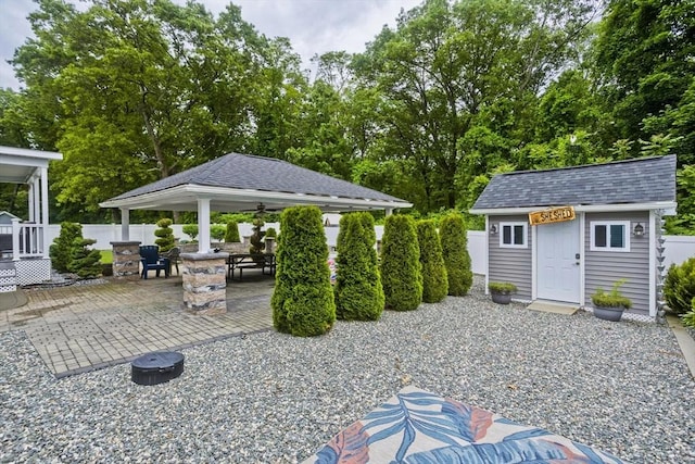 210 Naismith, Springfield, MA 01104 - view of patio featuring a gazebo, an outdoor structure, and view of scattered trees
