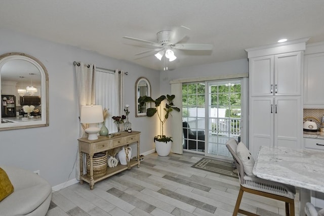 210 Naismith, Springfield, MA 01104 - dining space with a ceiling fan and light wood-style floors