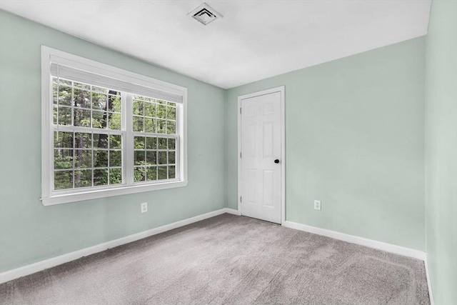 12 Blueberry Ln, Hudson, MA 01749 - spare room featuring baseboards and carpet flooring