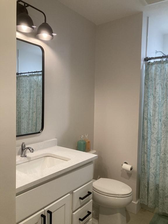 8 Salisbury Hill Blvd Unit 76, Worcester, MA 01609 - bathroom featuring vanity, tile patterned floors, and a shower with shower curtain
