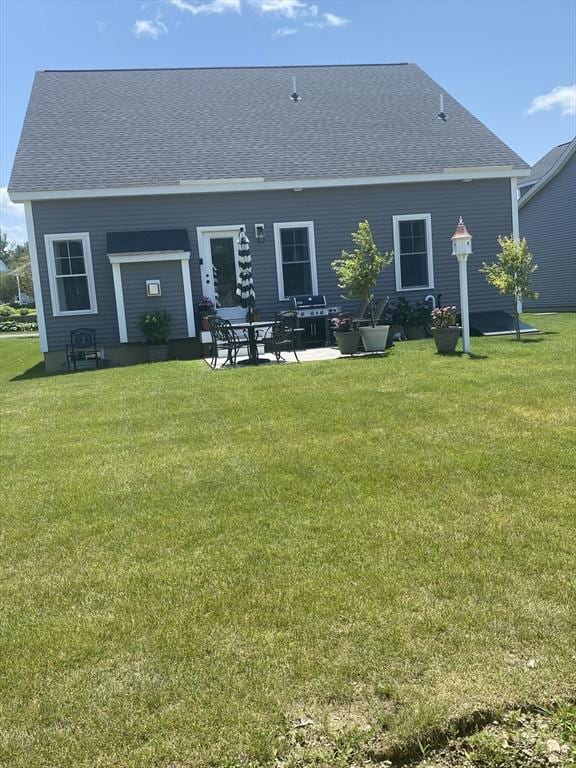 8 Salisbury Hill Blvd Unit 76, Worcester, MA 01609 - back of house featuring a yard, a shingled roof, and a patio
