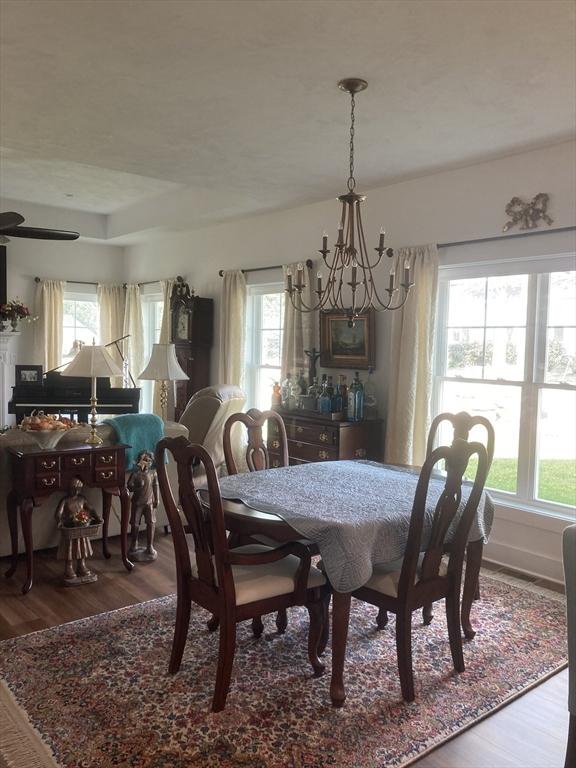 8 Salisbury Hill Blvd Unit 76, Worcester, MA 01609 - dining room with a chandelier, wood finished floors, and healthy amount of natural light