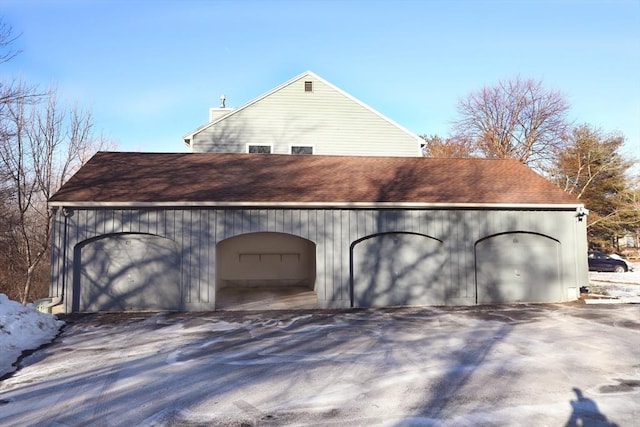 view of snow covered garage