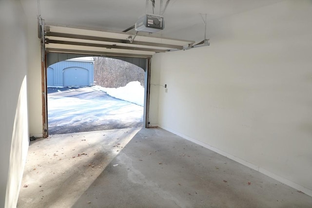 garage featuring a garage door opener