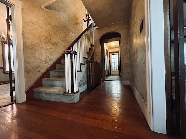 hallway featuring dark wood-type flooring