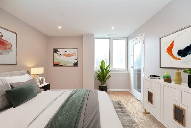 bedroom featuring light hardwood / wood-style flooring