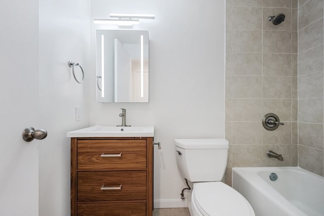 full bathroom with tiled shower / bath combo, vanity, and toilet