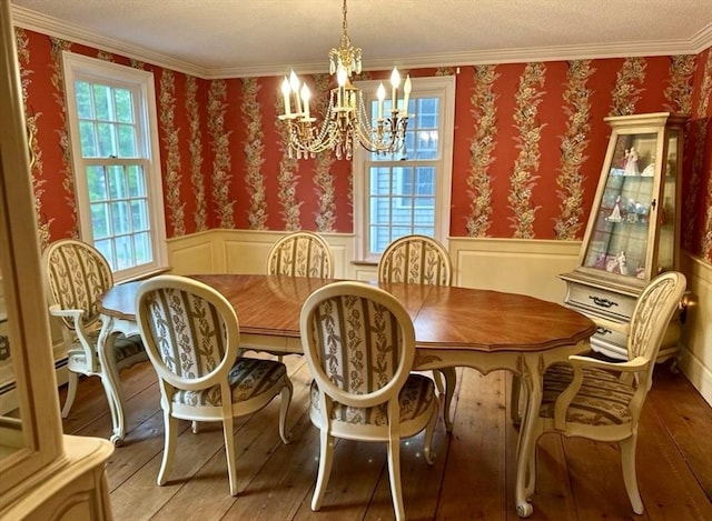 14 Alderbrook Dr, Topsfield, MA 01983 - dining room with a chandelier, a wainscoted wall, light wood finished floors, wallpapered walls, and a textured ceiling