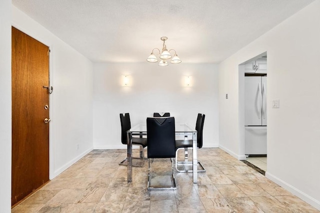9 Tara Dr Unit 8, Weymouth, MA 02188 - dining area with a chandelier and baseboards