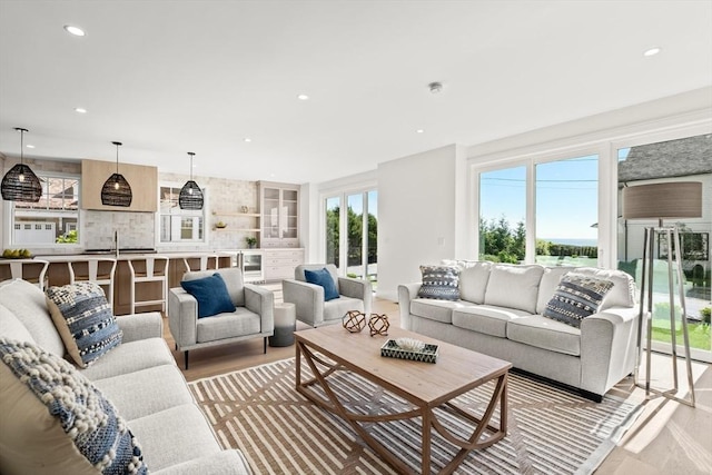 2 Collier Rd, Scituate, MA 02066 - living area with recessed lighting, beverage cooler, and a water view