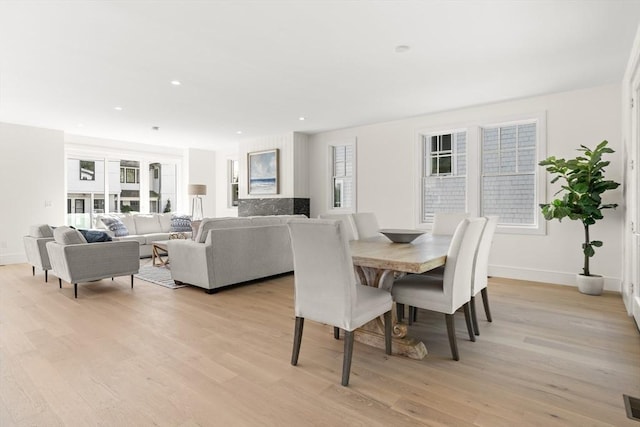 2 Collier Rd, Scituate, MA 02066 - dining area featuring light wood-style flooring, baseboards, and recessed lighting