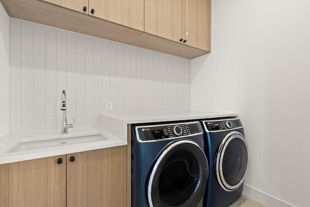 2 Collier Rd, Scituate, MA 02066 - laundry area featuring washer and clothes dryer and cabinet space