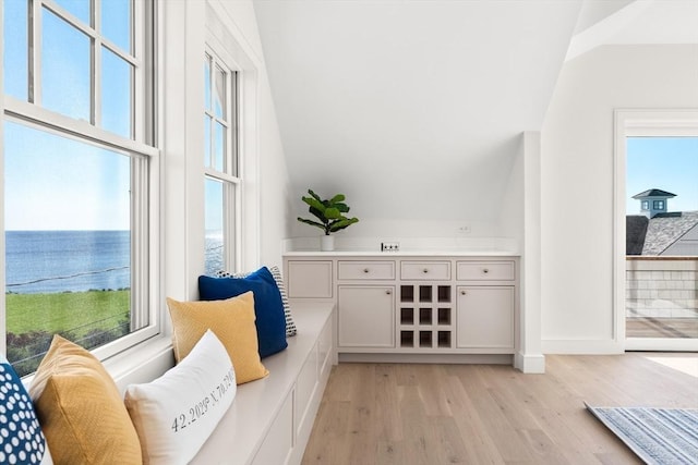 2 Collier Rd, Scituate, MA 02066 - sitting room with lofted ceiling, light wood-style flooring, a water view, and baseboards