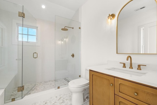 2 Collier Rd, Scituate, MA 02066 - bathroom featuring vanity, a shower stall, toilet, and recessed lighting