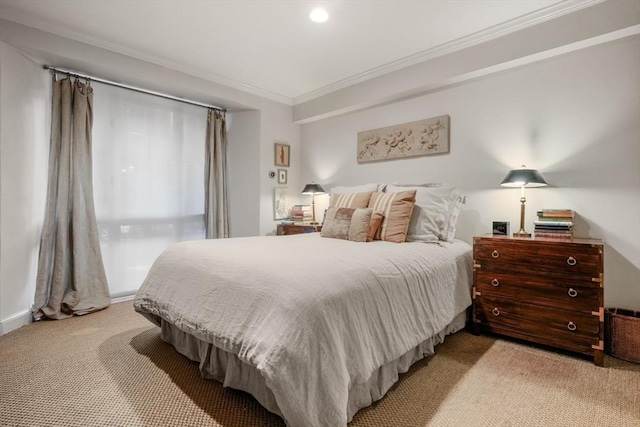 bedroom with ornamental molding and light carpet