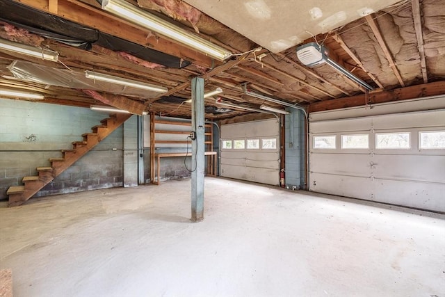garage featuring a garage door opener