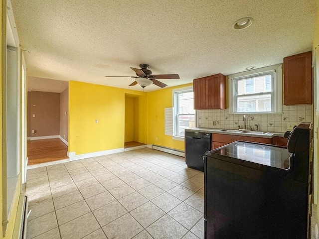 66 Taylor St, Holyoke, MA 01040 - kitchen featuring black dishwasher, a sink, baseboard heating, brown cabinetry, and backsplash