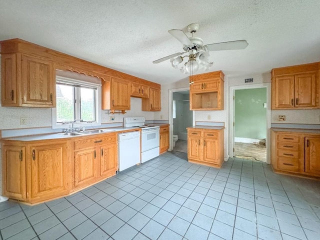 66 Taylor St, Holyoke, MA 01040 - kitchen featuring white appliances, a sink, a textured ceiling, a ceiling fan, and light tile patterned floors