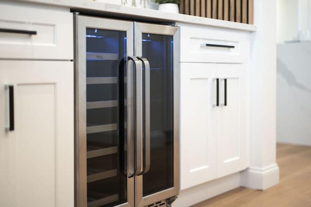 238 Bellevue St Unit 2, Newton, MA 02458 - detailed view of white cabinets and light wood-style floors