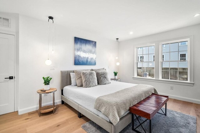238 Bellevue St Unit 2, Newton, MA 02458 - bedroom featuring light wood-style floors, baseboards, and recessed lighting
