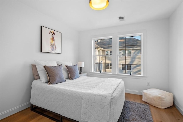 238 Bellevue St Unit 2, Newton, MA 02458 - bedroom featuring multiple windows and baseboards