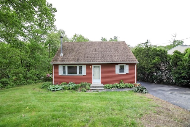 213 Nashua Rd, Billerica, MA 01862 - cape cod house with a front yard and roof with shingles