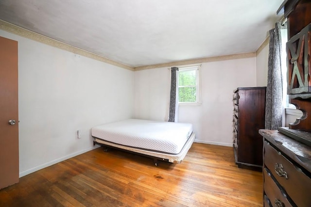 213 Nashua Rd, Billerica, MA 01862 - bedroom with light wood-type flooring and baseboards