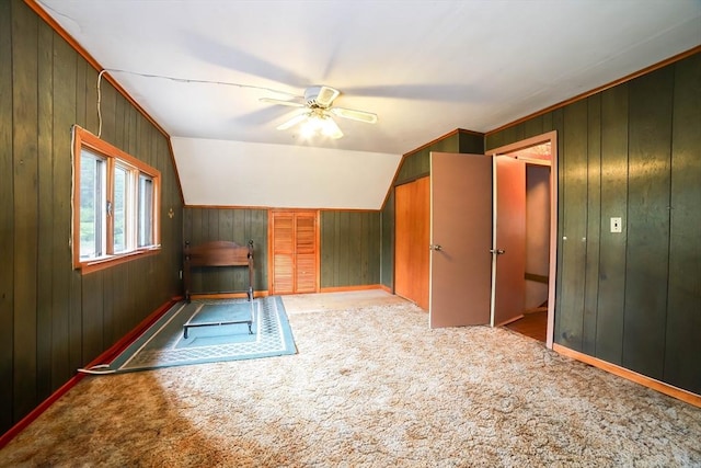 213 Nashua Rd, Billerica, MA 01862 - unfurnished living room featuring a ceiling fan, carpet floors, and wooden walls