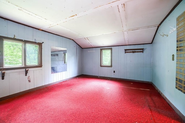 213 Nashua Rd, Billerica, MA 01862 - carpeted spare room with lofted ceiling and wooden walls