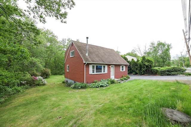 213 Nashua Rd, Billerica, MA 01862 - view of property exterior featuring a shingled roof and a yard